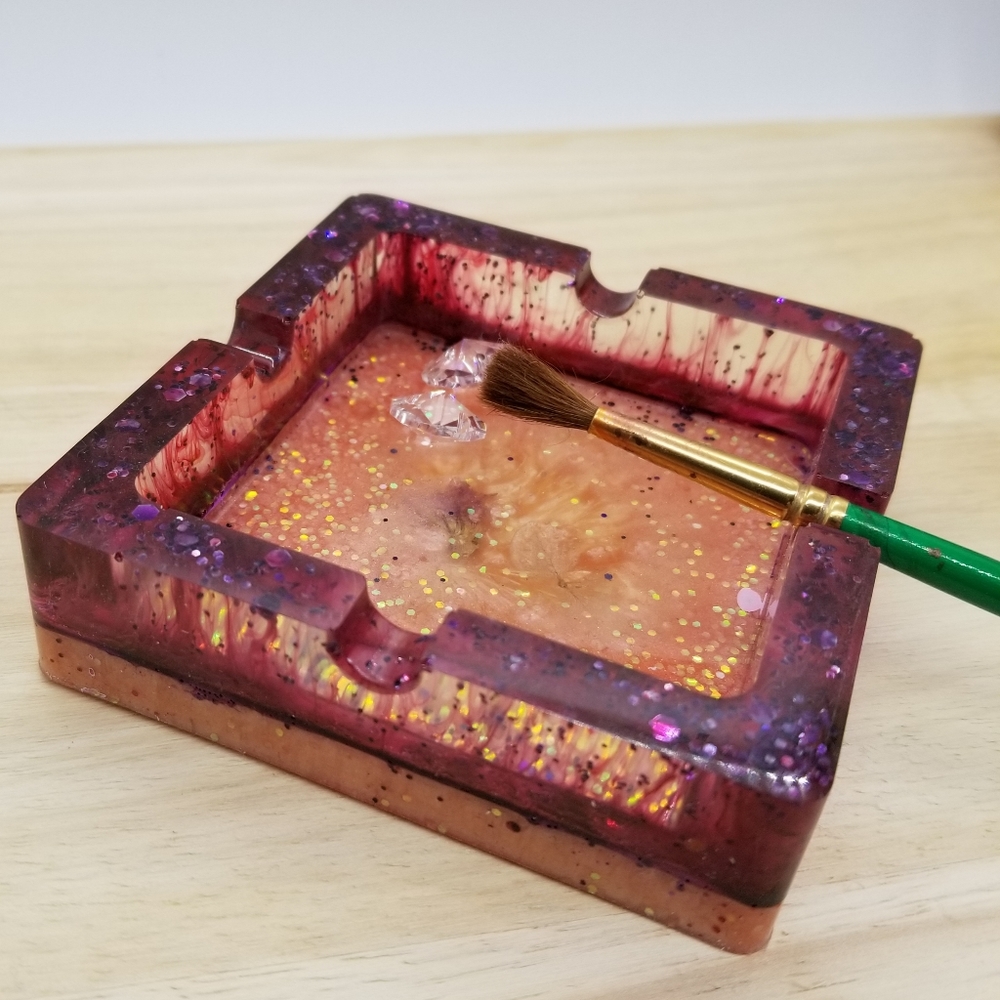 NWOT handcrafted pink/plum resin ash/trinket tray.